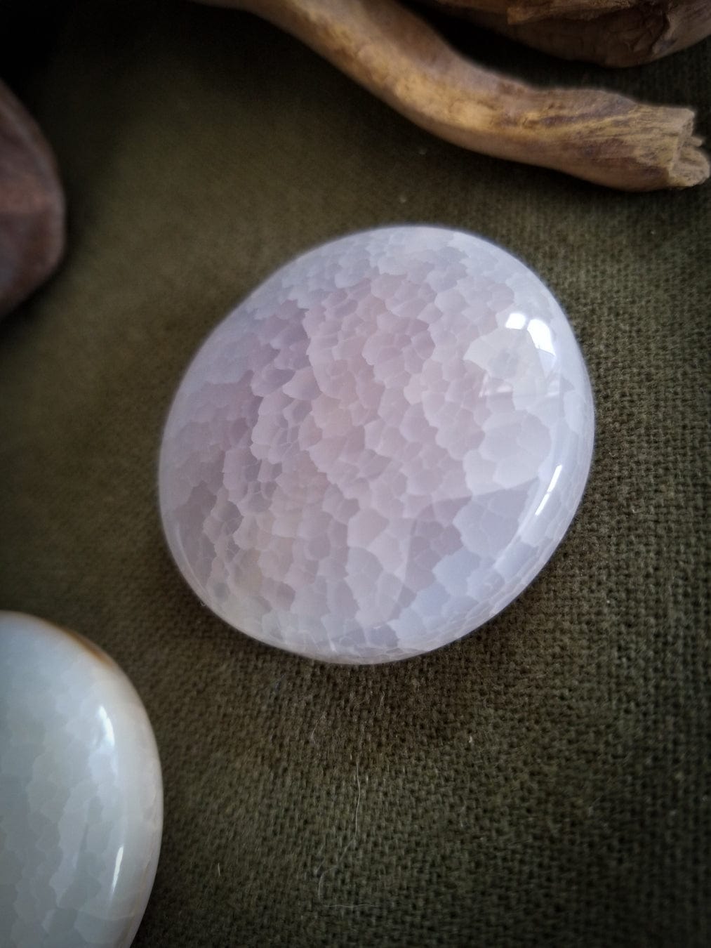 2 Flat Round Agate beads. Color - translucent with tones of white, pink, and pale yellow. Smooth with a cracked effect created by heat.
