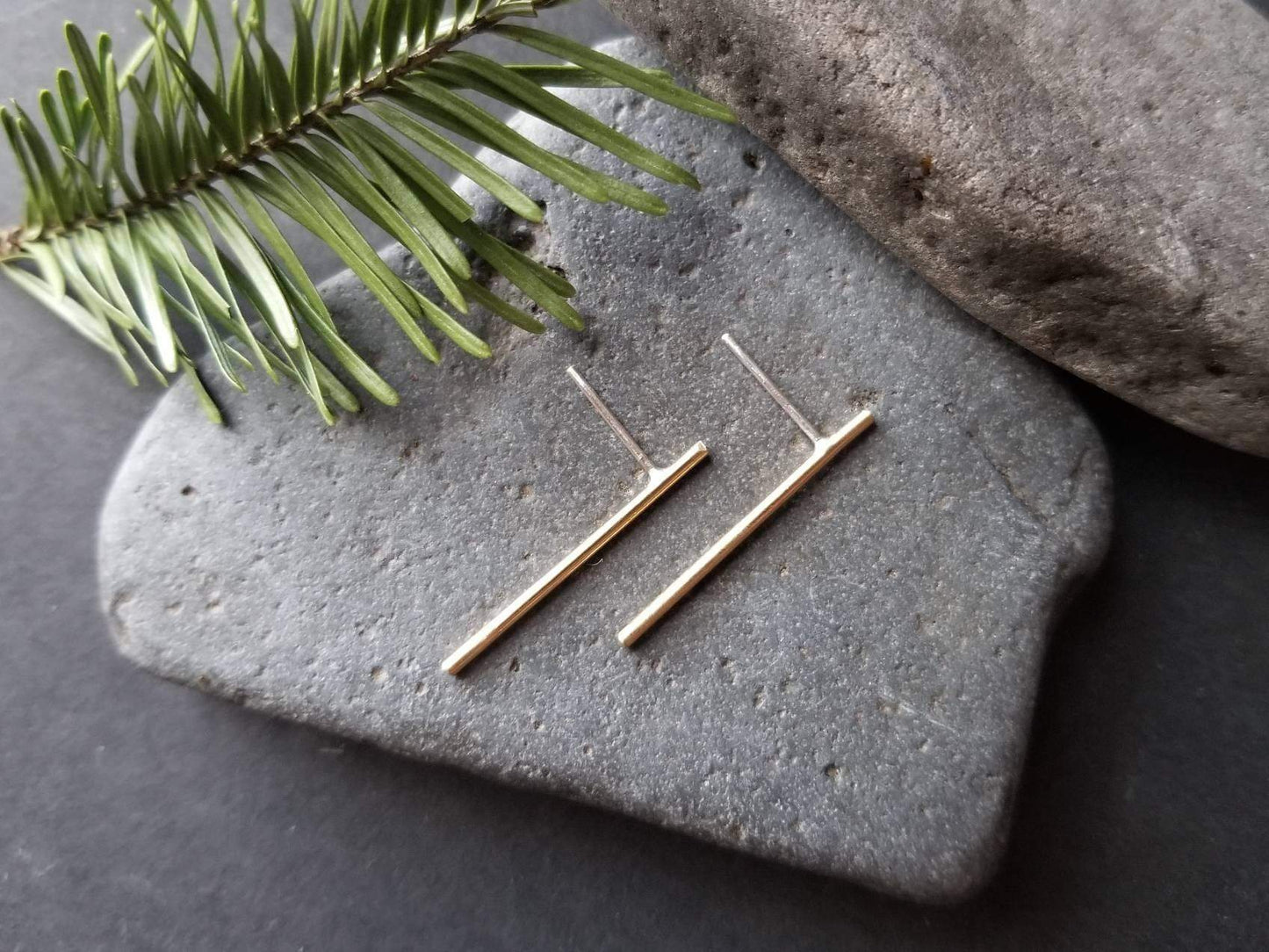 Handmade brass bar studs with sterling silver posts. Brass bars measure 1 inch in length.