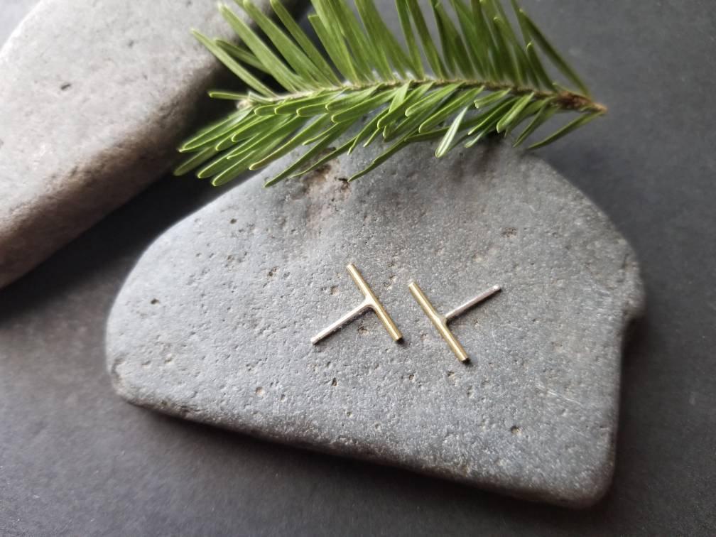 Handmade brass bar studs with sterling silver ear posts. Brass bars measure ½ inches in length.