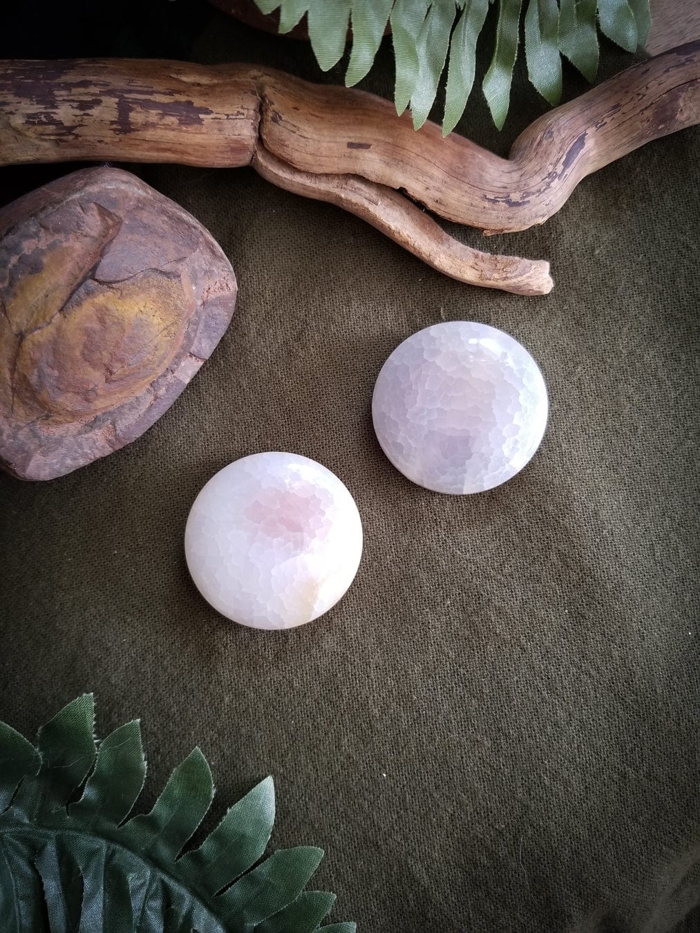 2 Flat Round Agate beads. Color - translucent with tones of white, pink, and pale yellow. Smooth with a cracked effect created by heat.