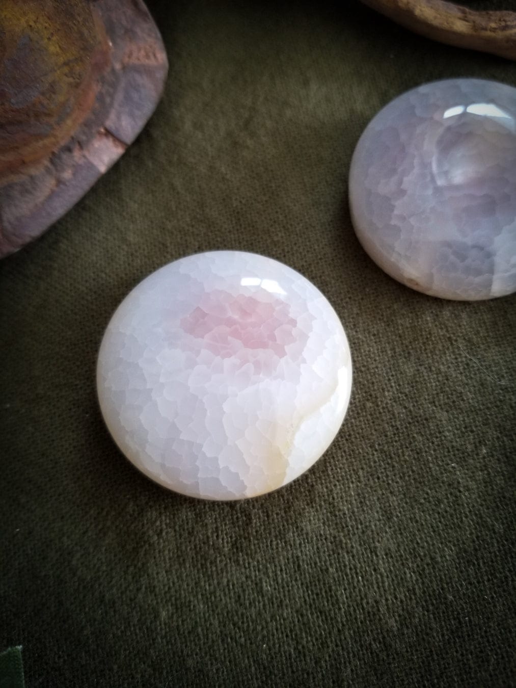 2 Flat Round Agate beads. Color - translucent with tones of white, pink, and pale yellow. Smooth with a cracked effect created by heat.