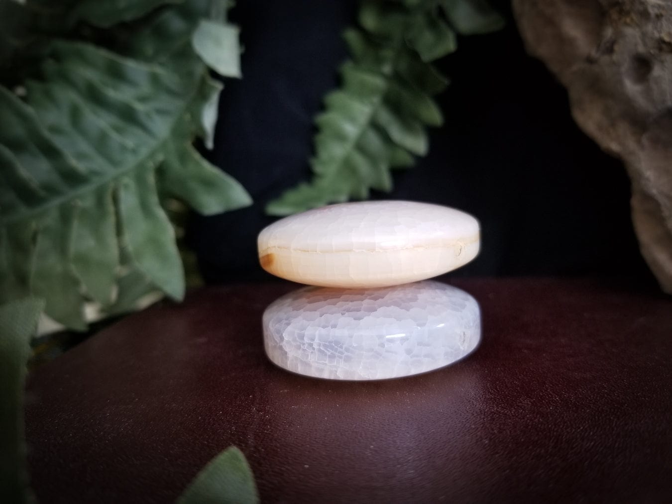 2 Flat Round Agate beads. Color - translucent with tones of white, pink, and pale yellow. Smooth with a cracked effect created by heat.