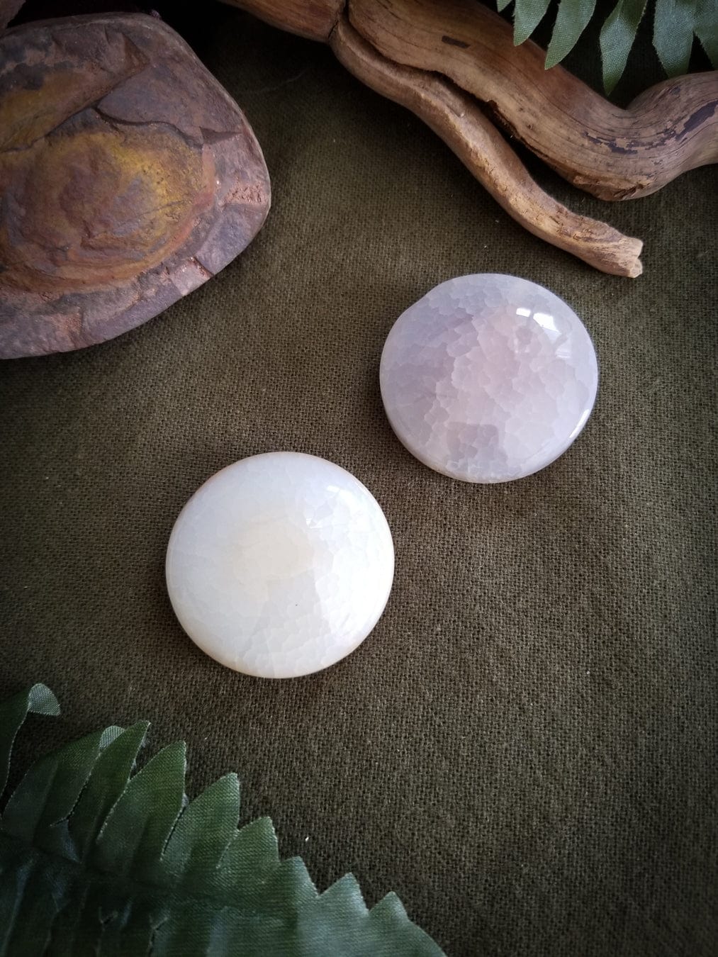 2 Flat Round Agate beads. Color - translucent with tones of white, pink, and pale yellow. Smooth with a cracked effect created by heat.