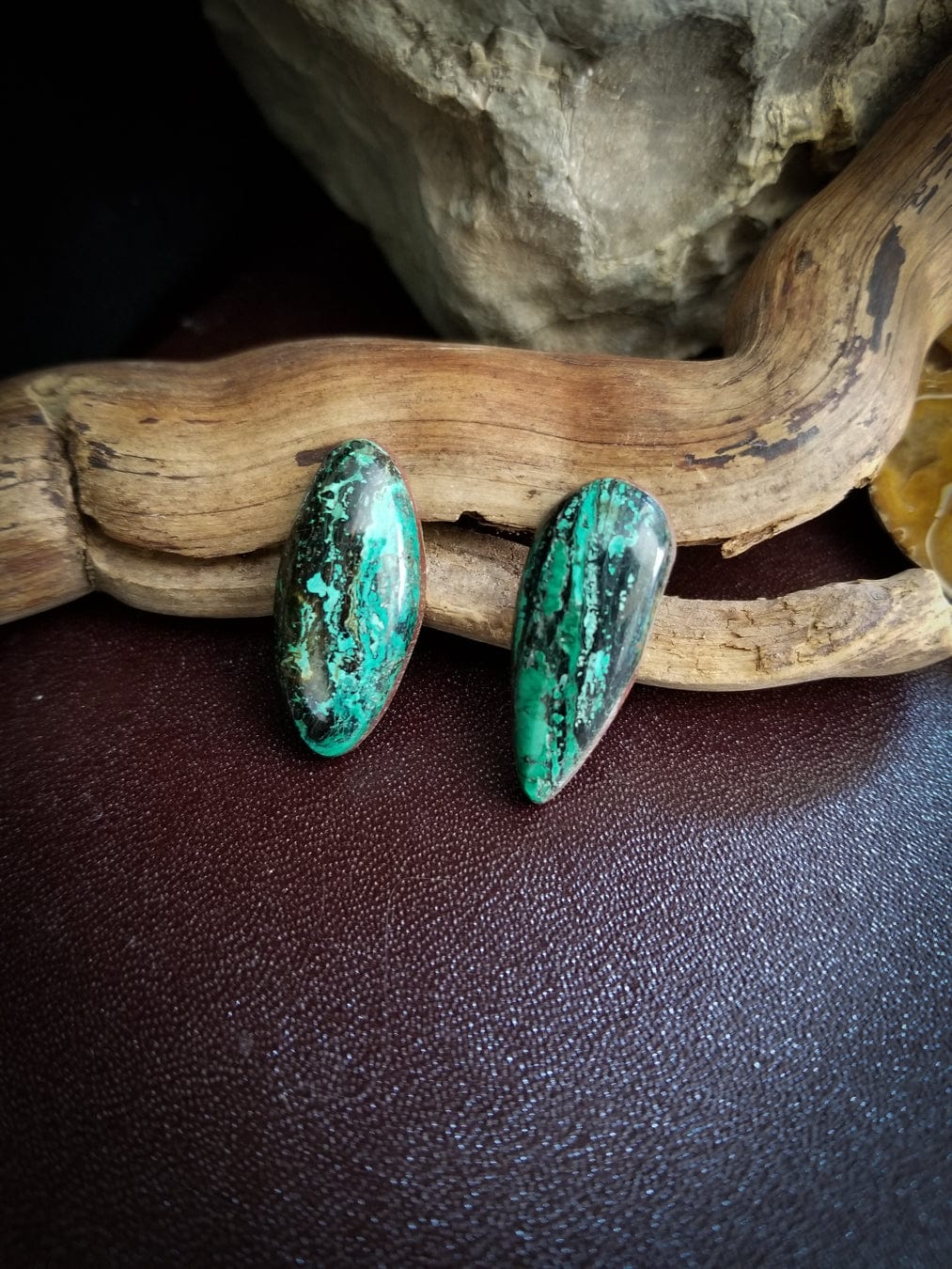 Chrysocolla oval and teardrop shaped cabochons. Green, turquoise and black